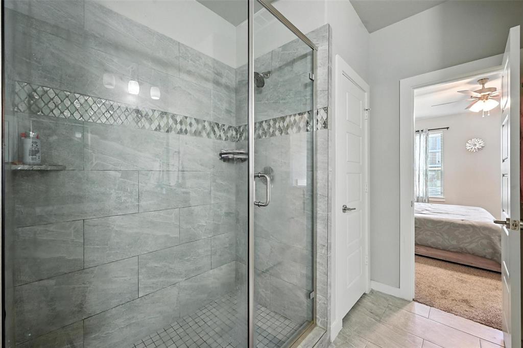 113 Nathan Drive Princeton, TX 75407 - Photo 24 of 39 a bathroom with a shower and a sink