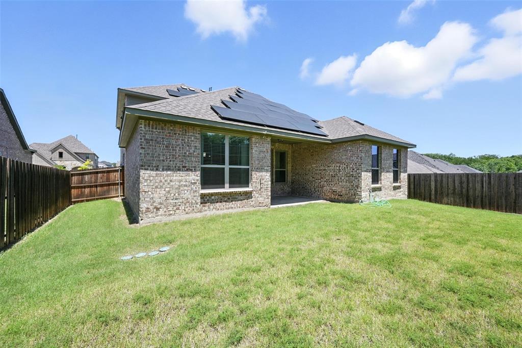 113 Nathan Drive Princeton, TX 75407 - Photo 37 of 39 a front view of a house with garden