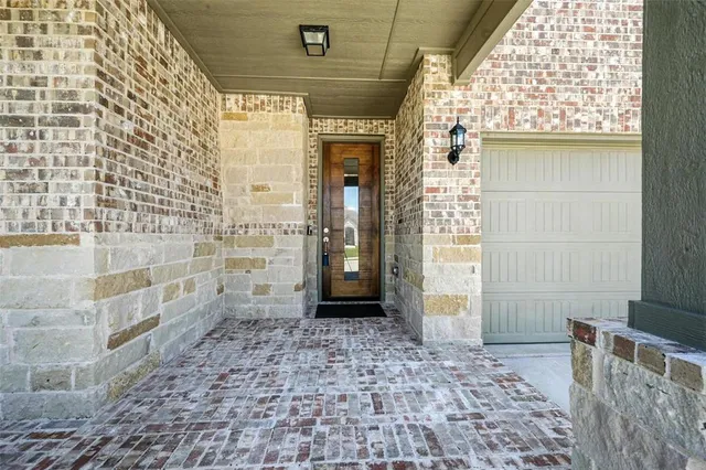 a view of a door with a wooden door