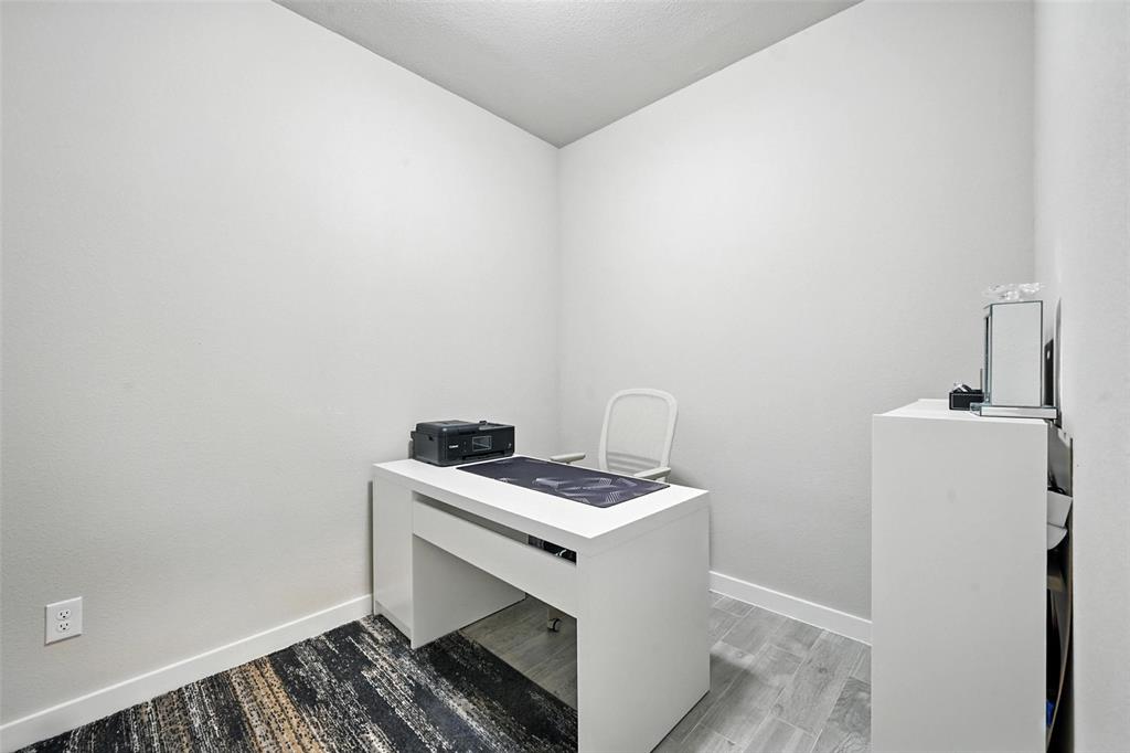 113 Nathan Drive Princeton, TX 75407 - Photo 9 of 39 a room with storage and utility