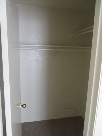 a view of small space with racks on the wall