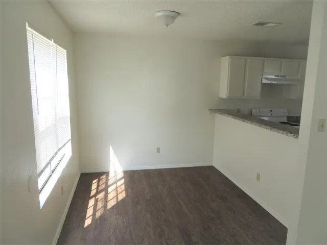 a view of lot of kitchen and window