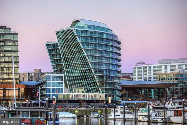 a front view of a building with glass windows