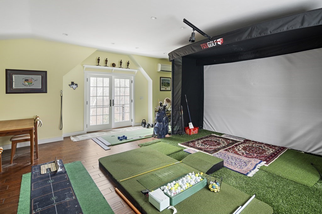 64 Jernegan Pond Road Edgartown, MA 02539 - Photo 24 of 25 a bed sitting in a bedroom next to a window with yard