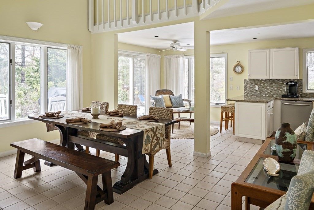 64 Jernegan Pond Road Edgartown, MA 02539 - Photo 5 of 25 a view of a a dining room with furniture window and wooden floor