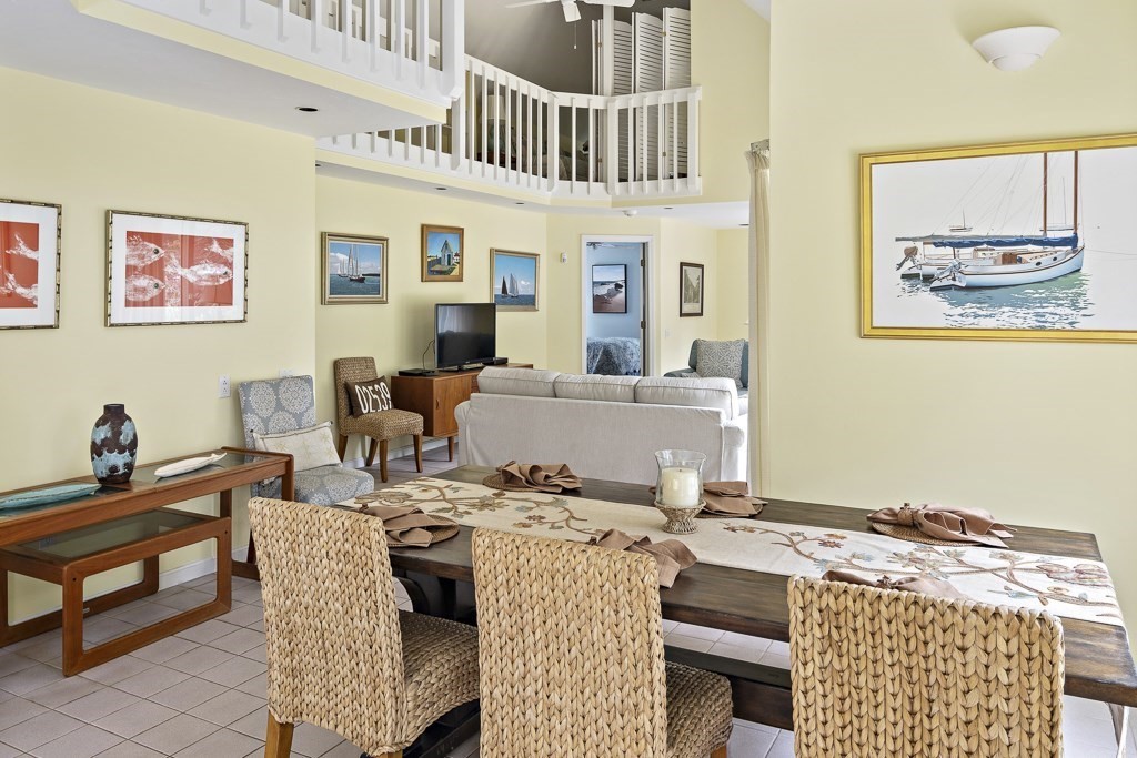64 Jernegan Pond Road Edgartown, MA 02539 - Photo 6 of 25 a living room with a couch and a table