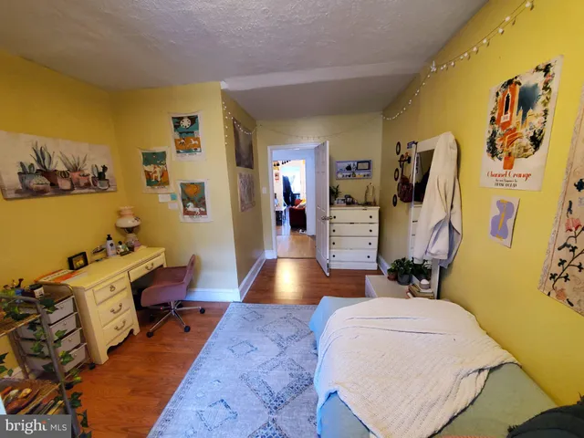 a living room with a couch and a couch