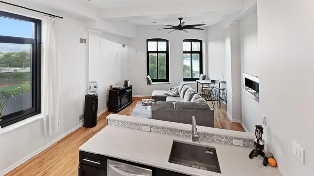 a kitchen with a sink and a refrigerator