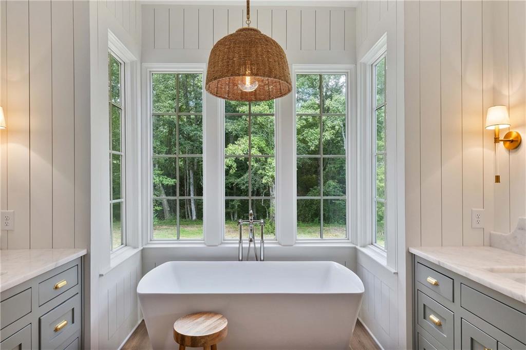 9311 Waterworks Road Chattahoochee Hills, GA 30268 - Photo 28 of 57 a dining room with a window and a table