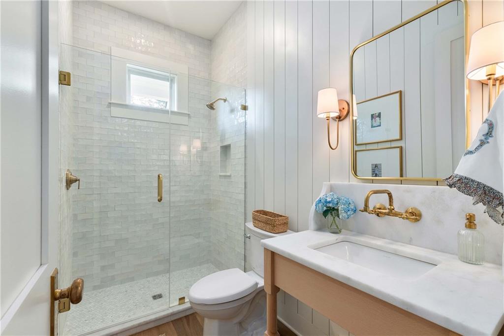 9311 Waterworks Road Chattahoochee Hills, GA 30268 - Photo 34 of 57 a bathroom with a sink toilet and shower