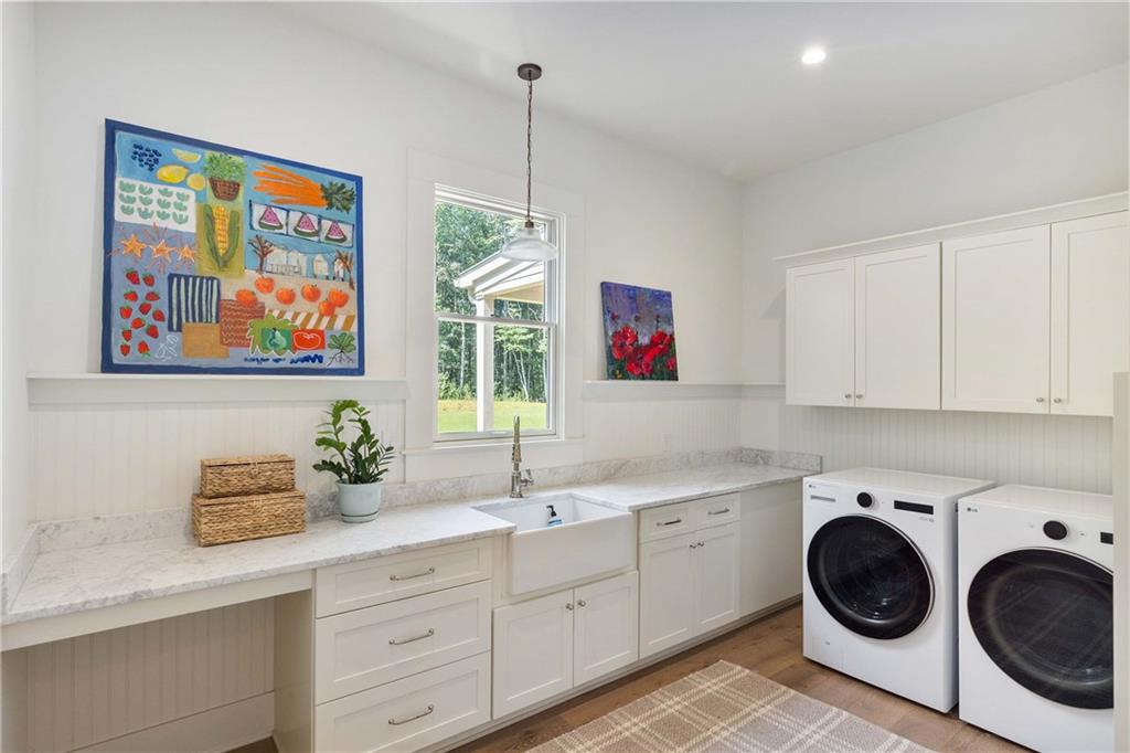 9311 Waterworks Road Chattahoochee Hills, GA 30268 - Photo 36 of 57 a view of a kitchen with sink cabinets and appliances