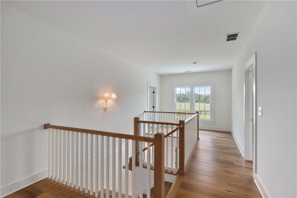 9311 Waterworks Road Chattahoochee Hills, GA 30268 - Photo 38 of 57 a view of entryway with wooden floor