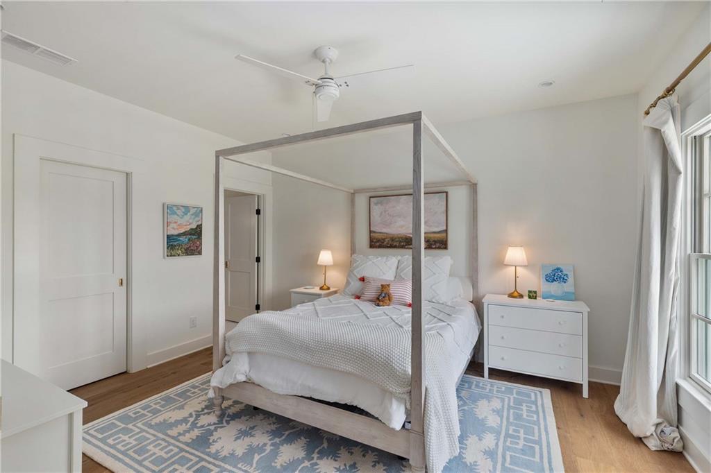 9311 Waterworks Road Chattahoochee Hills, GA 30268 - Photo 40 of 57 a bedroom with a bed and a mirror