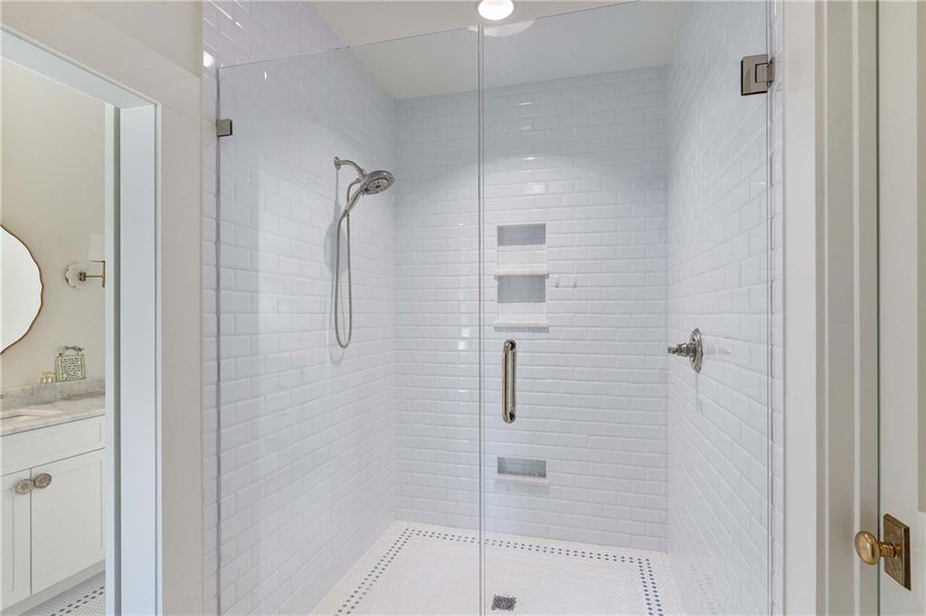 9311 Waterworks Road Chattahoochee Hills, GA 30268 - Photo 43 of 57 a bathroom with a shower