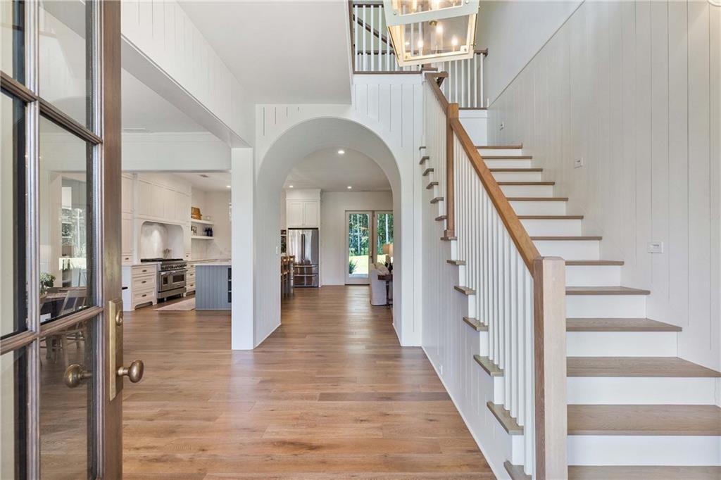 9311 Waterworks Road Chattahoochee Hills, GA 30268 - Photo 5 of 57 a view of entryway and hall with wooden floor