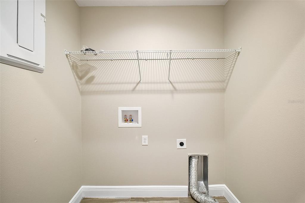 444 Fahnstock Street Eustis, FL 32726 - Photo 13 of 25 a bathroom with a shower