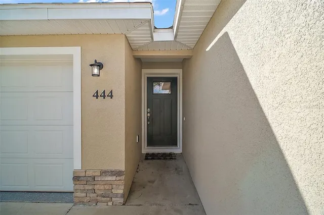 a view of a house with a patio