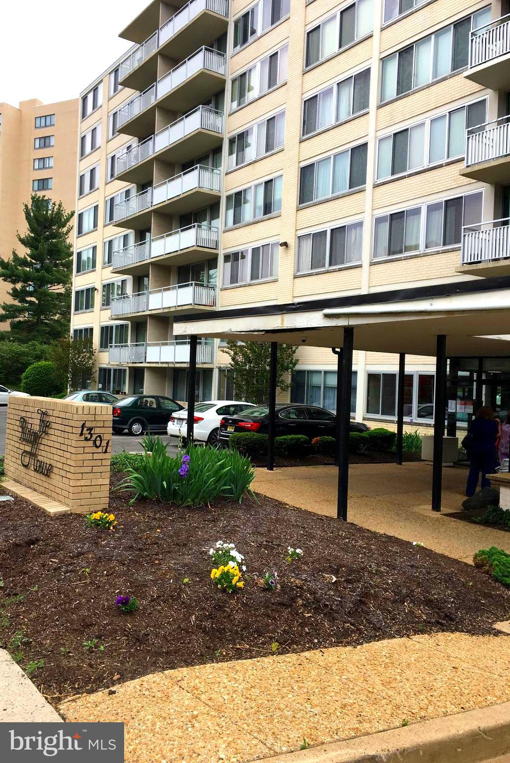 1301 South Arlington Ridge Road, Unit 203 Arlington, VA 22202 - Photo 1 of 31 Inviting front entrance with secure lobby