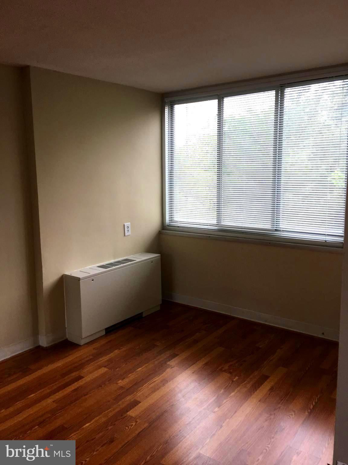 1301 South Arlington Ridge Road, Unit 203 Arlington, VA 22202 - Photo 19 of 31 Bedroom with dual closets and large windows