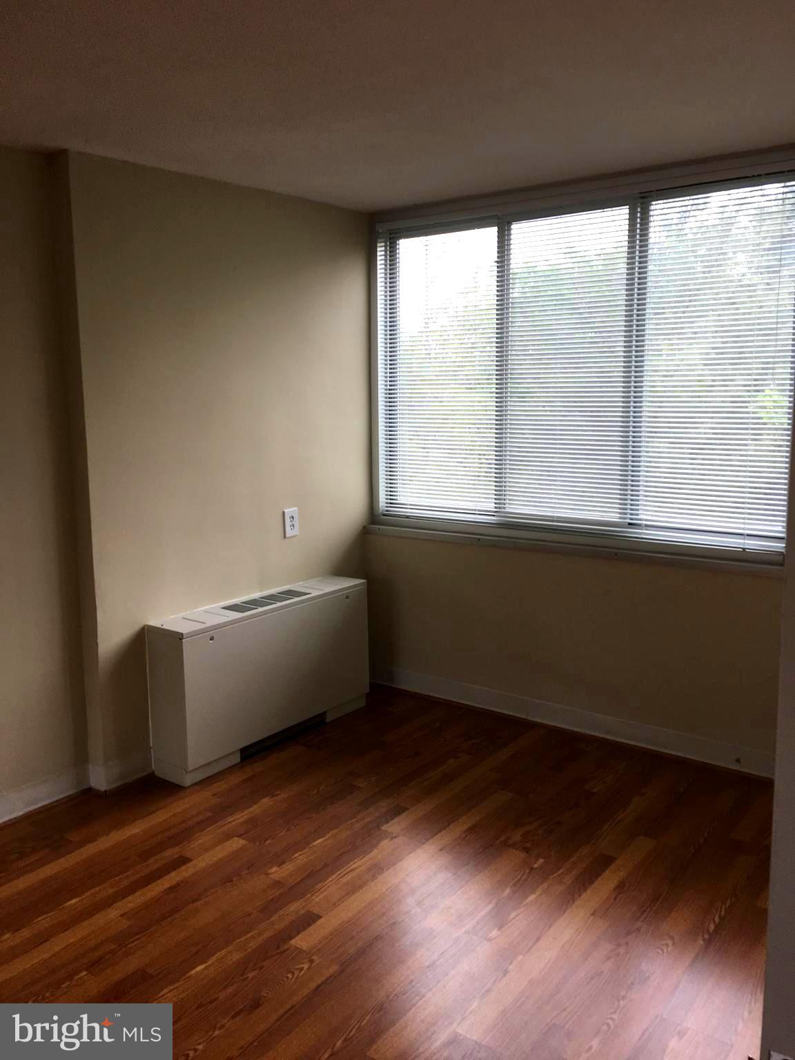 1301 South Arlington Ridge Road, Unit 203 Arlington, VA 22202 - Photo 20 of 31 Laminate wood floors throughout bedroom