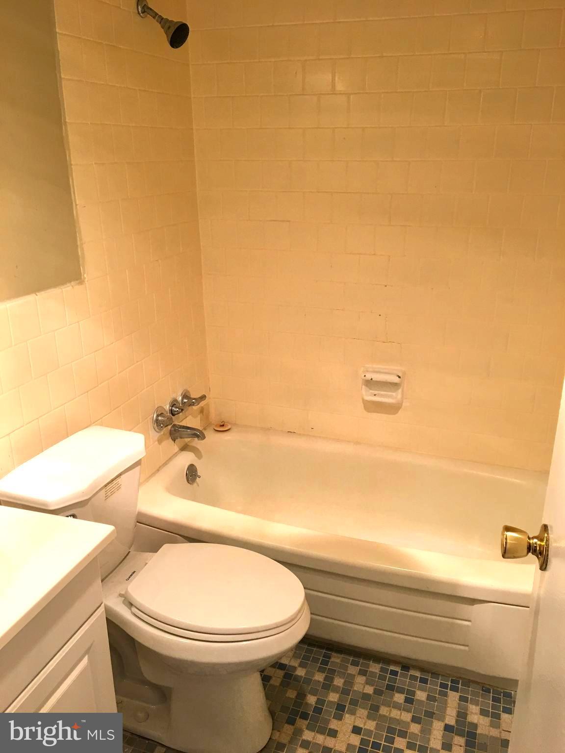 1301 South Arlington Ridge Road, Unit 203 Arlington, VA 22202 - Photo 26 of 31 Tile floor with shower/tub