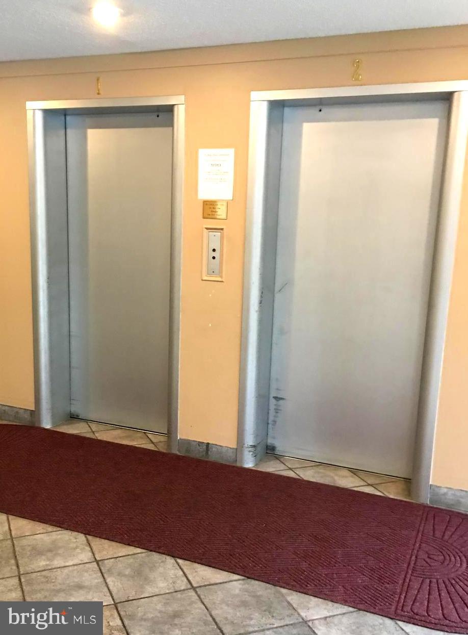 1301 South Arlington Ridge Road, Unit 203 Arlington, VA 22202 - Photo 5 of 31 Lobby Elevators