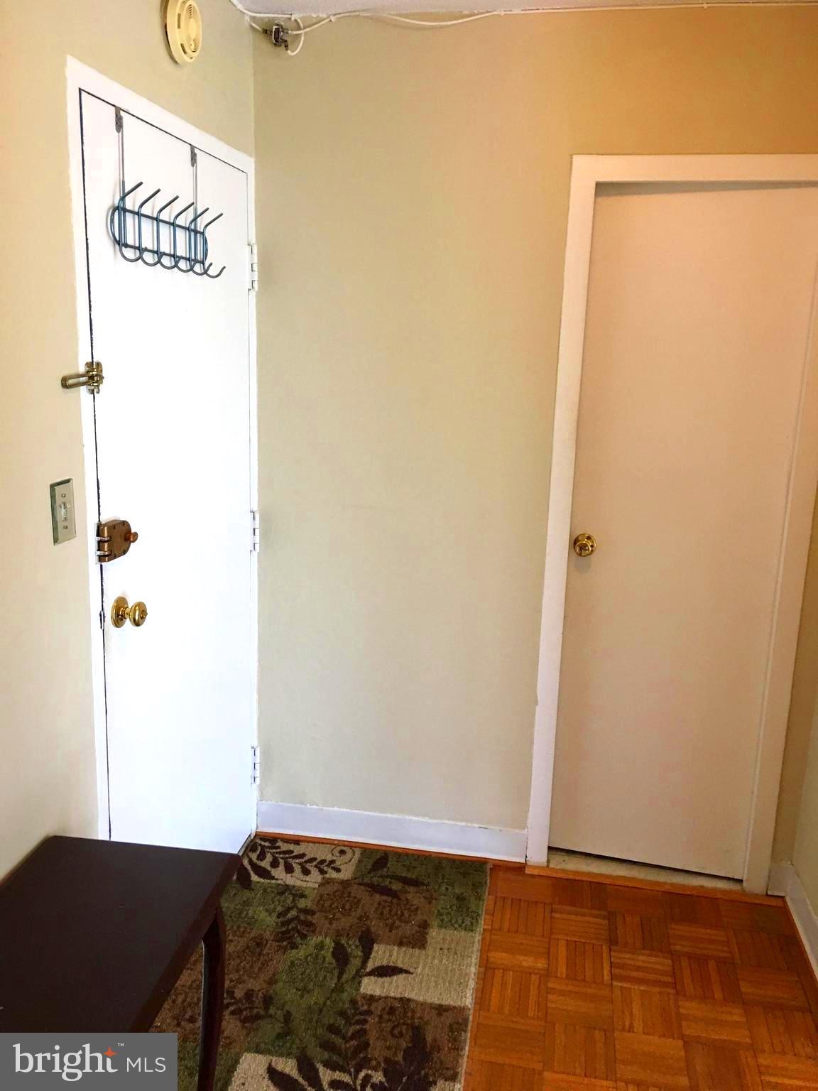 1301 South Arlington Ridge Road, Unit 203 Arlington, VA 22202 - Photo 6 of 31 Large entry foyer with Parquet floors