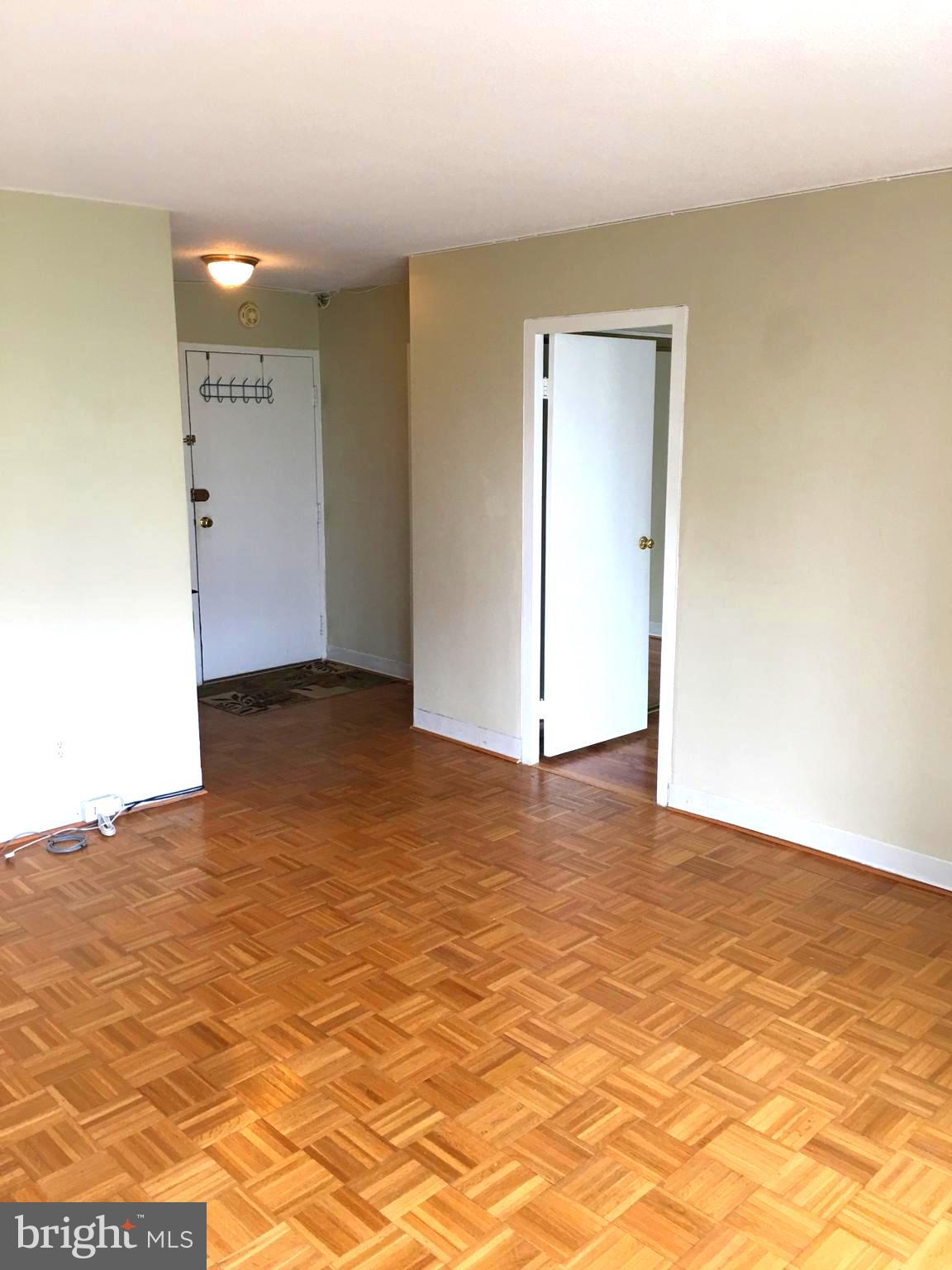 1301 South Arlington Ridge Road, Unit 203 Arlington, VA 22202 - Photo 7 of 31 Parquet floors throughout living room