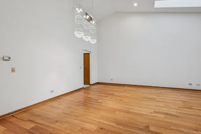 a kitchen with stainless steel appliances granite countertop a sink stove and microwave