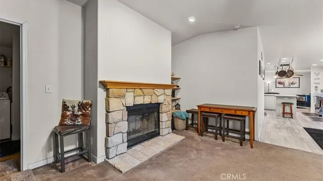 a spacious bedroom with a bed and a window