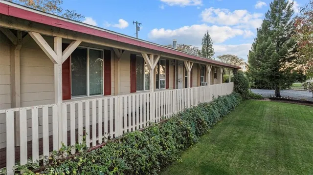 an aerial view of a house with a ocean view