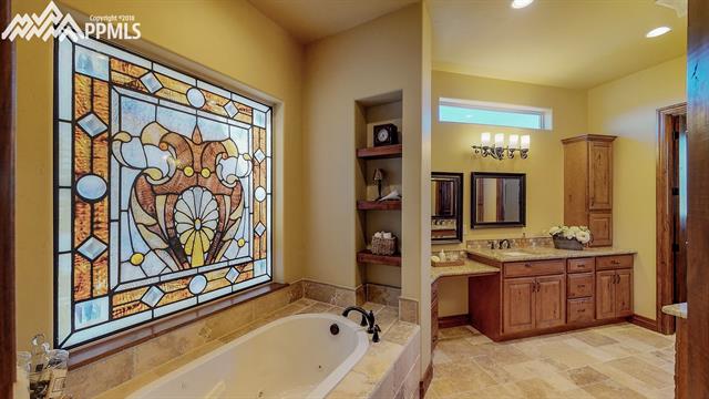 1023 Old North Gate Road Colorado Springs, CO 80921 - Photo 17 of 34 Master Jetted Tub w/ Stained Glass Window