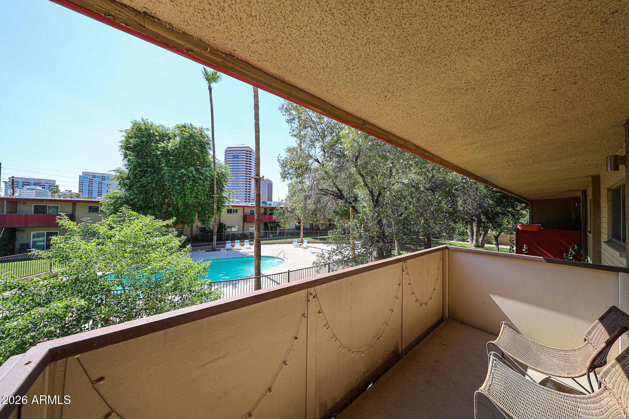 357 East Thomas Road, Unit A208 Phoenix, AZ 85012 - Photo 30 of 36 a view of a building from a balcony
