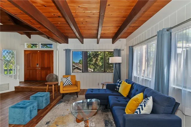 a kitchen with stainless steel appliances a sink a stove and a refrigerator