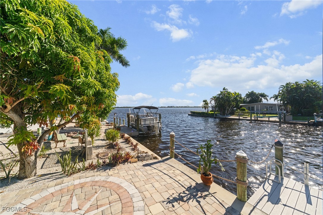 2743 Janet Street Matlacha, FL 33993 - Photo 40 of 45 a view of a lake with a house