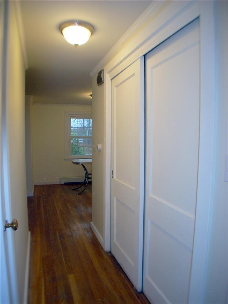 6 Bacon Road Hyannis, MA 02601 - Photo 15 of 27 a view of hallway with wooden floor
