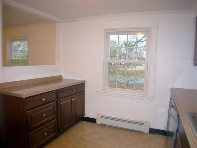 6 Bacon Road Hyannis, MA 02601 - Photo 17 of 27 a room with a dresser and a window