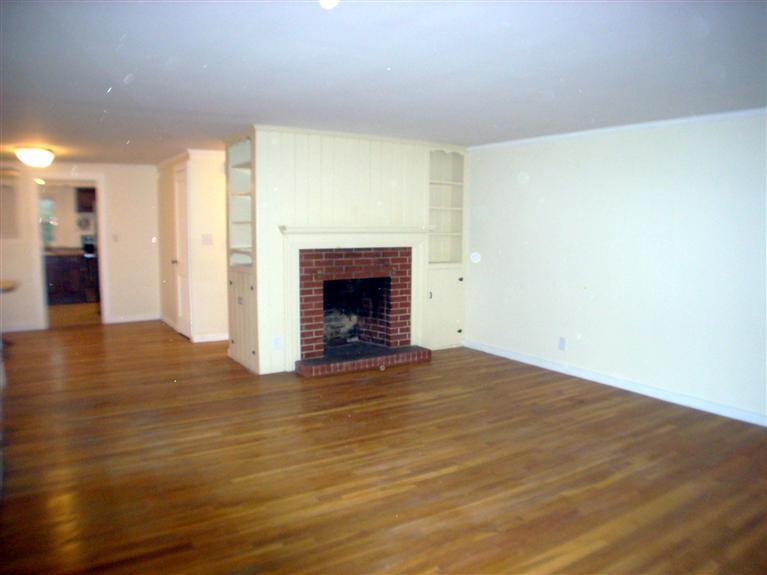 6 Bacon Road Hyannis, MA 02601 - Photo 18 of 27 a view of an empty room with wooden floor