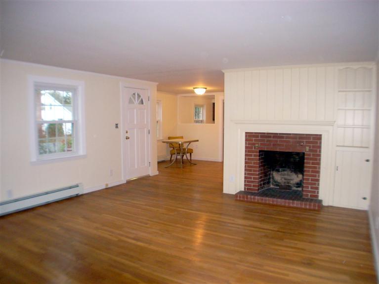 6 Bacon Road Hyannis, MA 02601 - Photo 4 of 27 a view of a livingroom with a fireplace