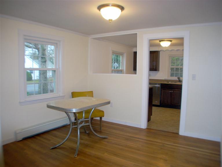 6 Bacon Road Hyannis, MA 02601 - Photo 7 of 27 a workspace room with wooden floor and windows