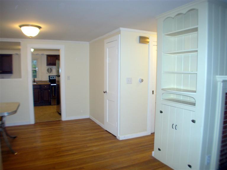 6 Bacon Road Hyannis, MA 02601 - Photo 8 of 27 a view of empty room with wooden floor