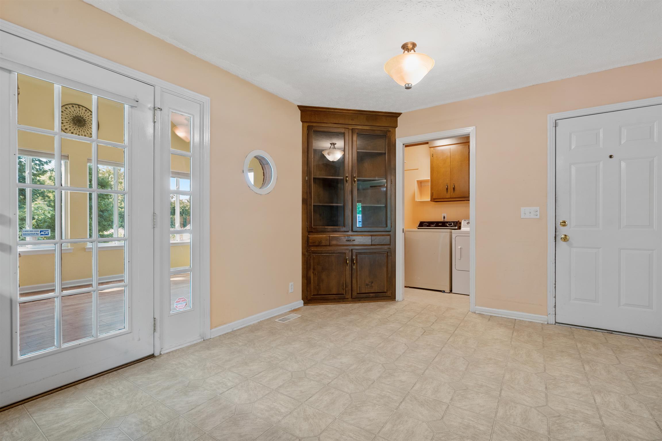 5338 New Chapel Road Springfield, TN 37172 - Photo 11 of 22 an empty room with windows and cabinet