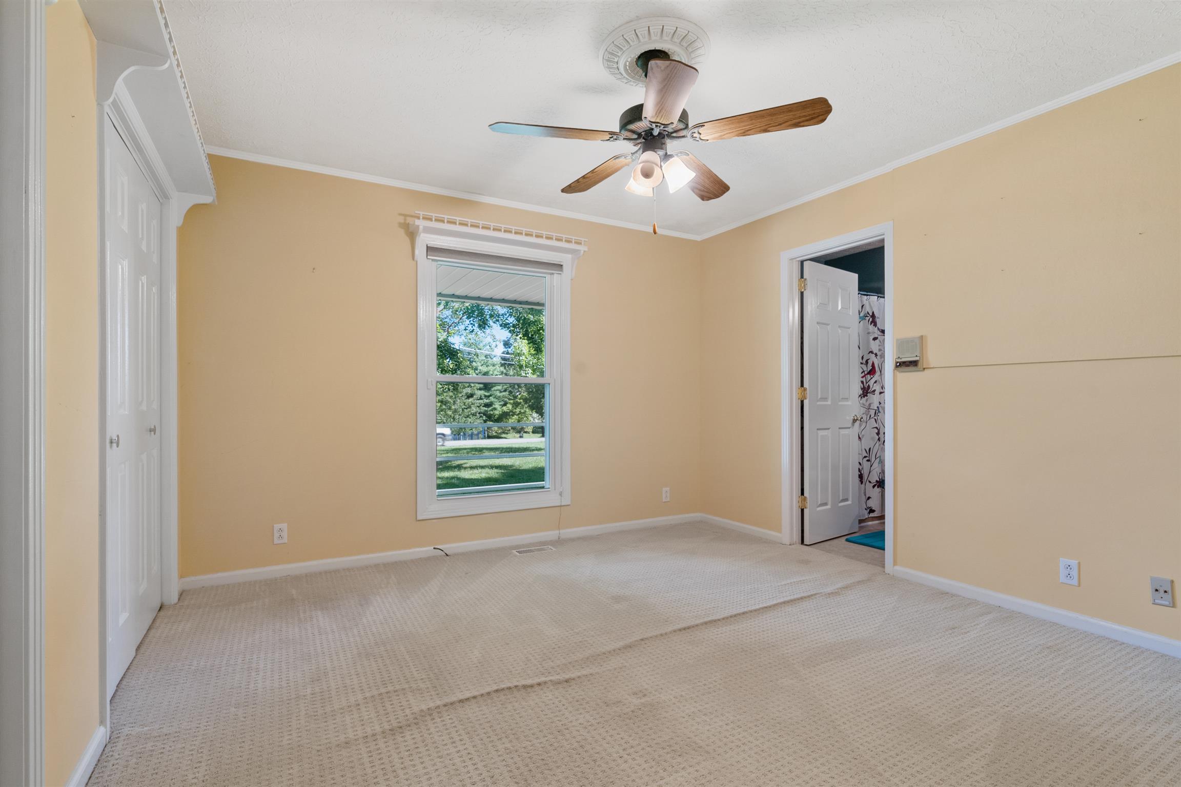5338 New Chapel Road Springfield, TN 37172 - Photo 14 of 22 a view of a livingroom with a ceiling fan and window