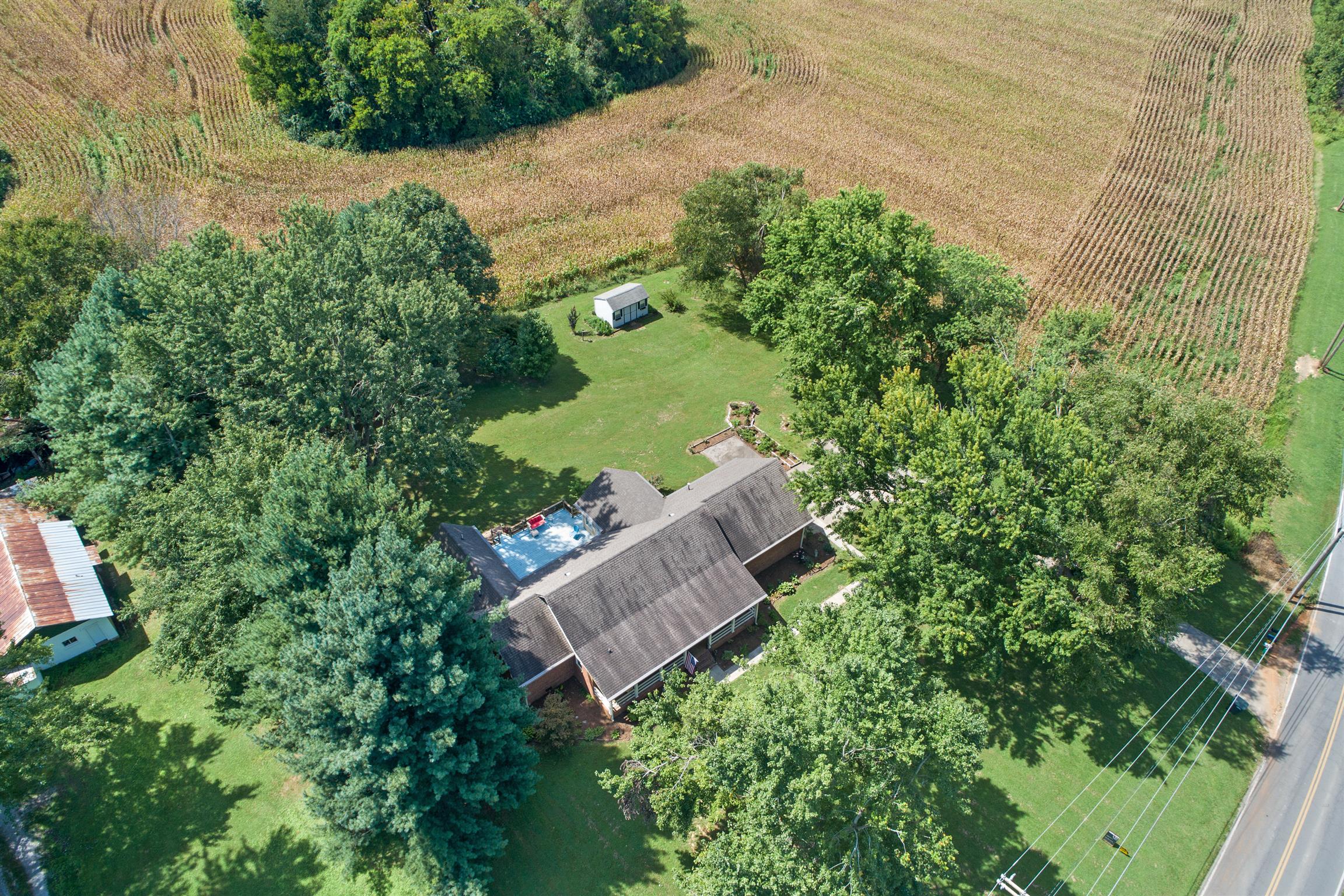 5338 New Chapel Road Springfield, TN 37172 - Photo 21 of 22 an aerial view of a house with a yard and garden