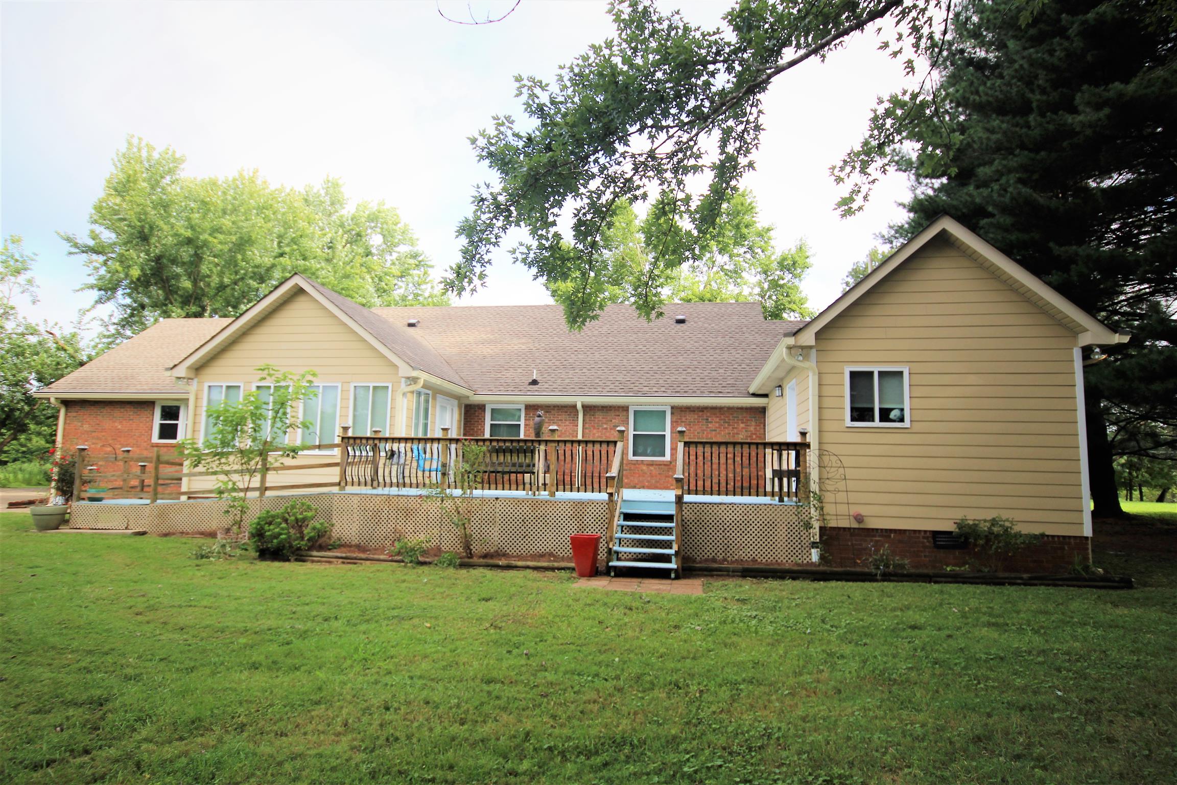 5338 New Chapel Road Springfield, TN 37172 - Photo 4 of 22 a front view of a house with a yard and trees