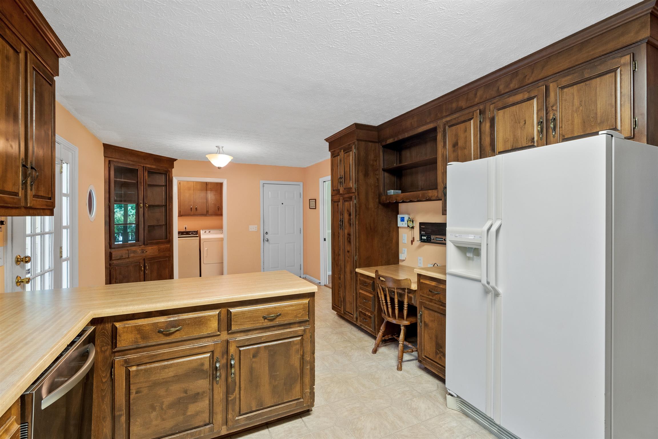 5338 New Chapel Road Springfield, TN 37172 - Photo 10 of 22 a kitchen with stainless steel appliances a refrigerator and a stove