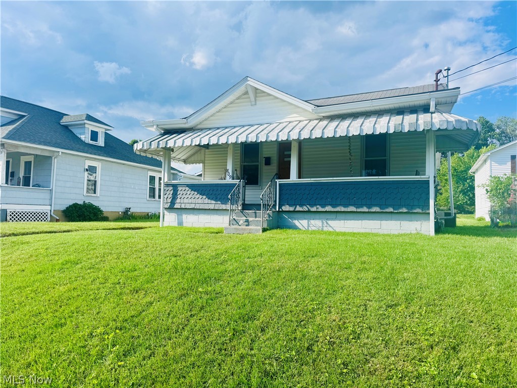 809 28th Street Vienna, WV 26105 - Photo 2 of 21 FRONT OF HOME W COVERED PORCH