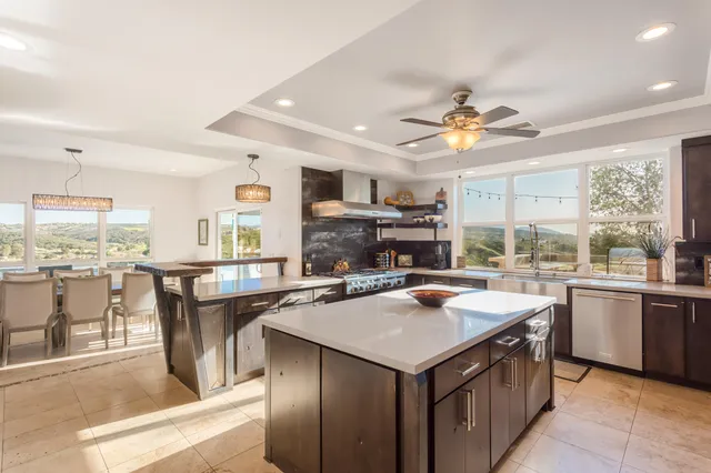 a bathroom with a sink mirror and toilet