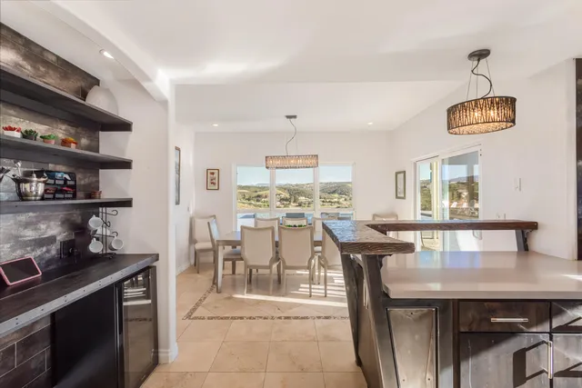 a bedroom with a bed and a potted plant