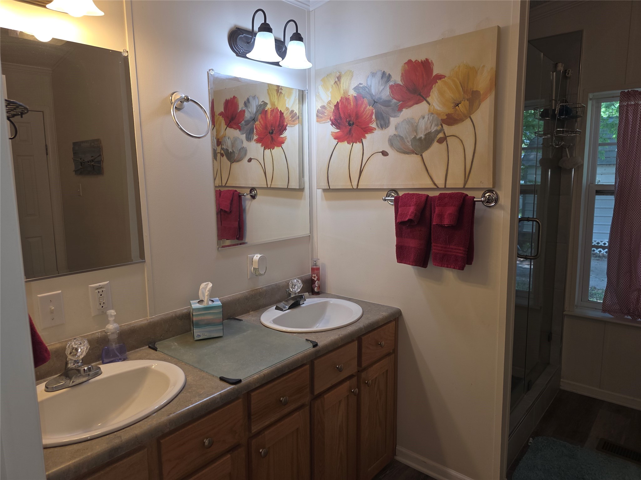 70 Montego Way Point Blank, TX 77364 - Photo 11 of 41 a bathroom with a sink vanity and a mirror